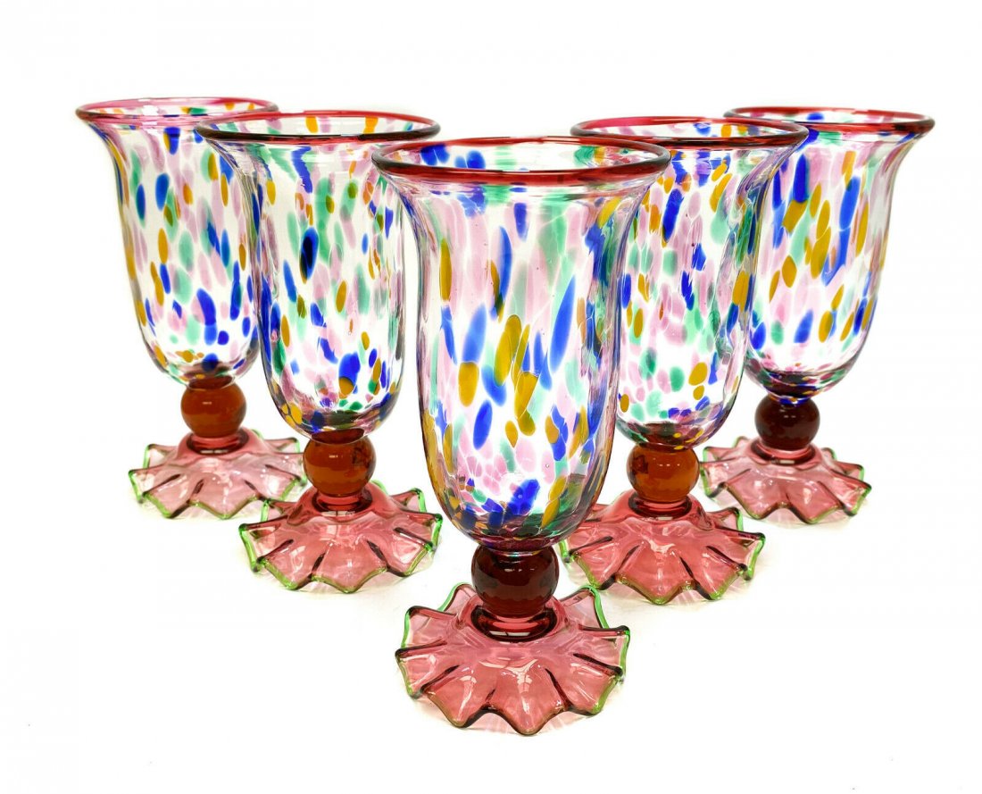 5 MacKenzie Childs Iced Tea Goblets in Molten Confetti: 5 piece MacKenzie Childs Art Glass tall iced tea goblets in Molten Confetti. Beautiful pink, yellow, and blue dots. Green ruffles to the base rim. Weight Approx., 10 lbs Measures Approx., 4 inches dia