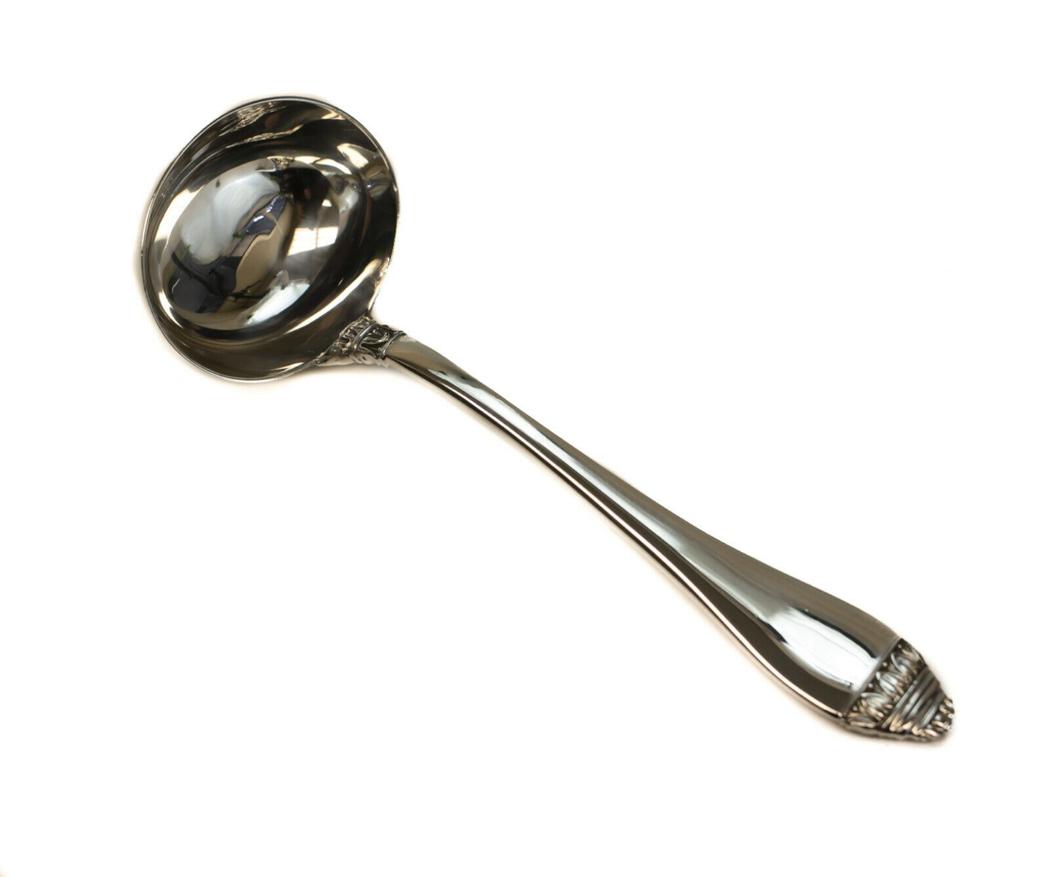 Buccellati Sterling Silver Ladle in French Empire: Buccellati sterling silver serving ladle in French Empire. Finely hand chased laurel leaves to the tips of the handles. Buccellati sterling silver marks to the verso. Weight Approx., 2.7 ozt Measures 