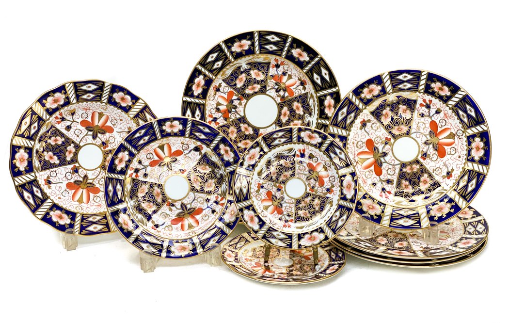 11 Royal Crown Derby Mixed Plates in Tradtiional Imari: 11 Royal Crown Derby mixed plates in Traditional Imari #2451. Blue panels, gold accents, and rust flowers throughout. Royal Crown Derby mark to the underside. Weight Approx.,5 lbs Measures Approx., Sm