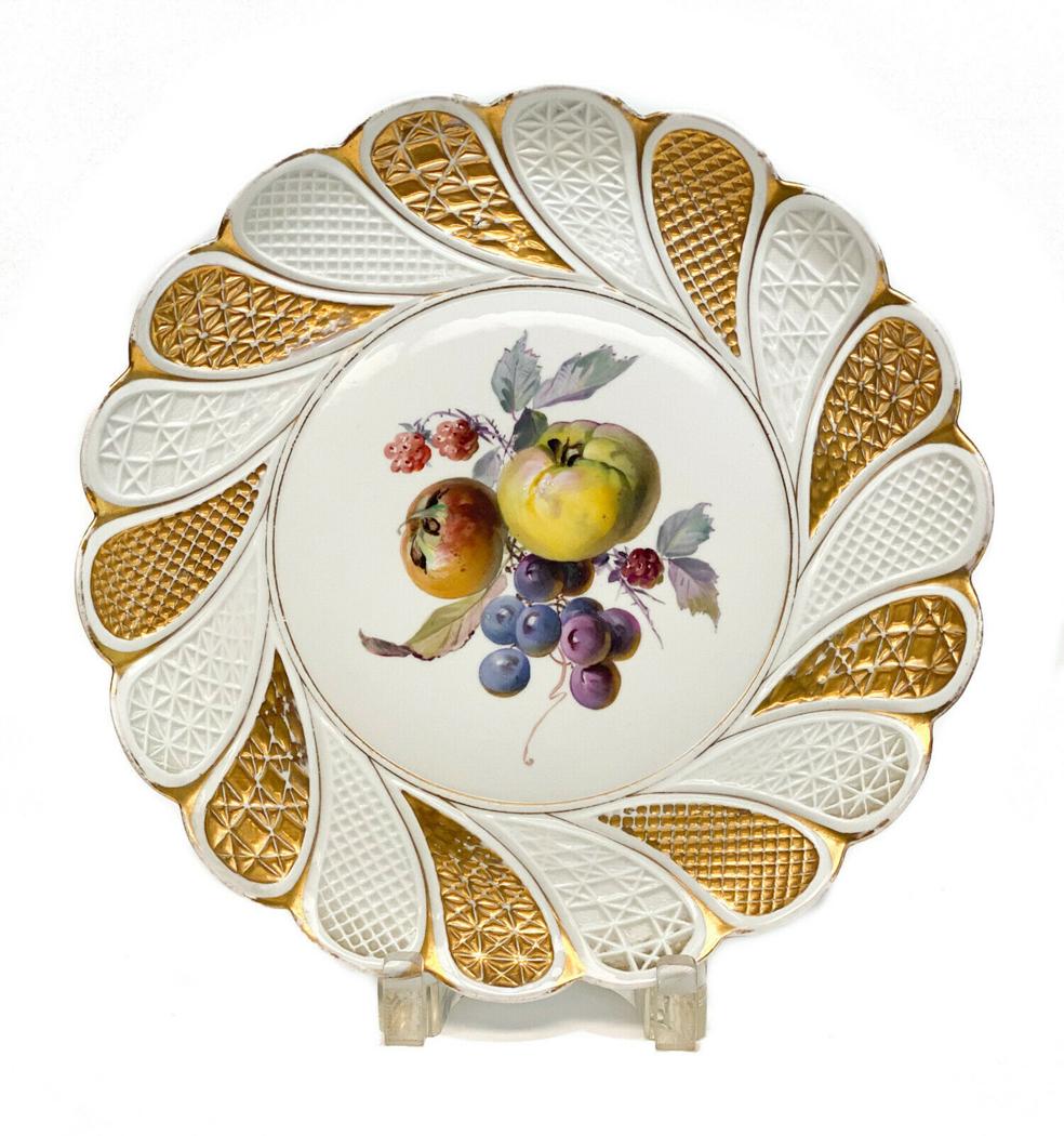 Meissen Hand Painted Fruit & Gilt Charger: Meissen Germany porcelain hand painted & gilt scallop rimmed charger. Hand painted fruits to the center with gilt to the textured rim. Meissen mark to the underside base. Weight Approx., 1.5 lbs Measu