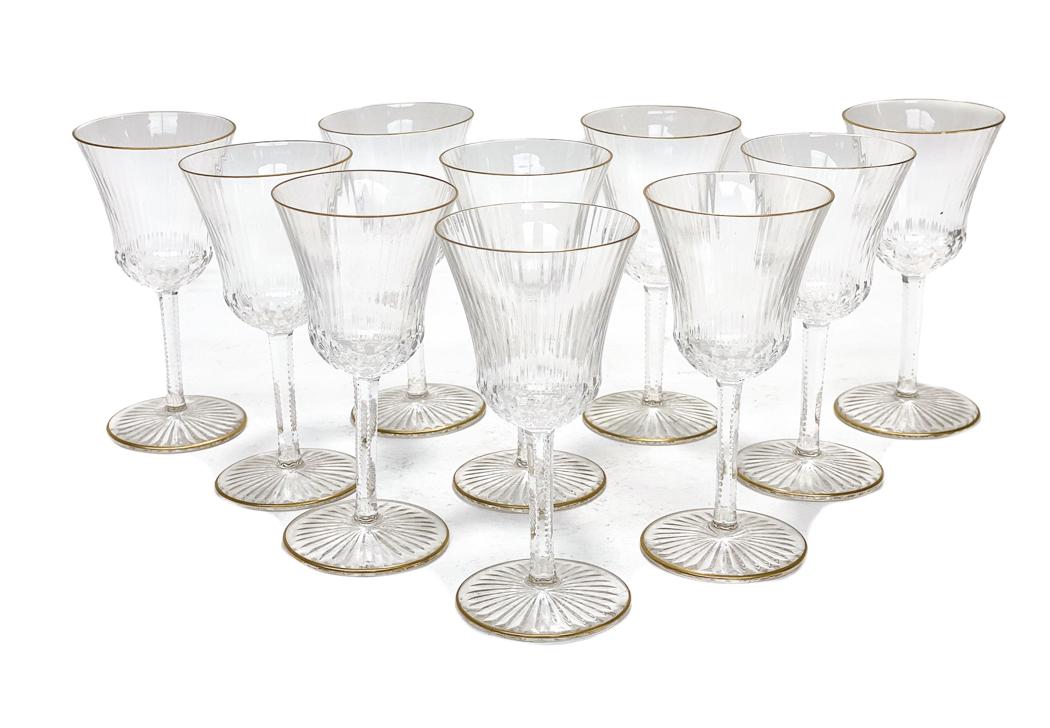10 St. Louis Apollo Claret Wine Goblet: 10 St. Louis Apollo Claret Wine Goblet. Lightly ribbed walls with gilt to the top and base rims. Acid etched Saint Louis mark to the underside base. Weight Approx., 6 lbs Measures Approx., 2.75 inches