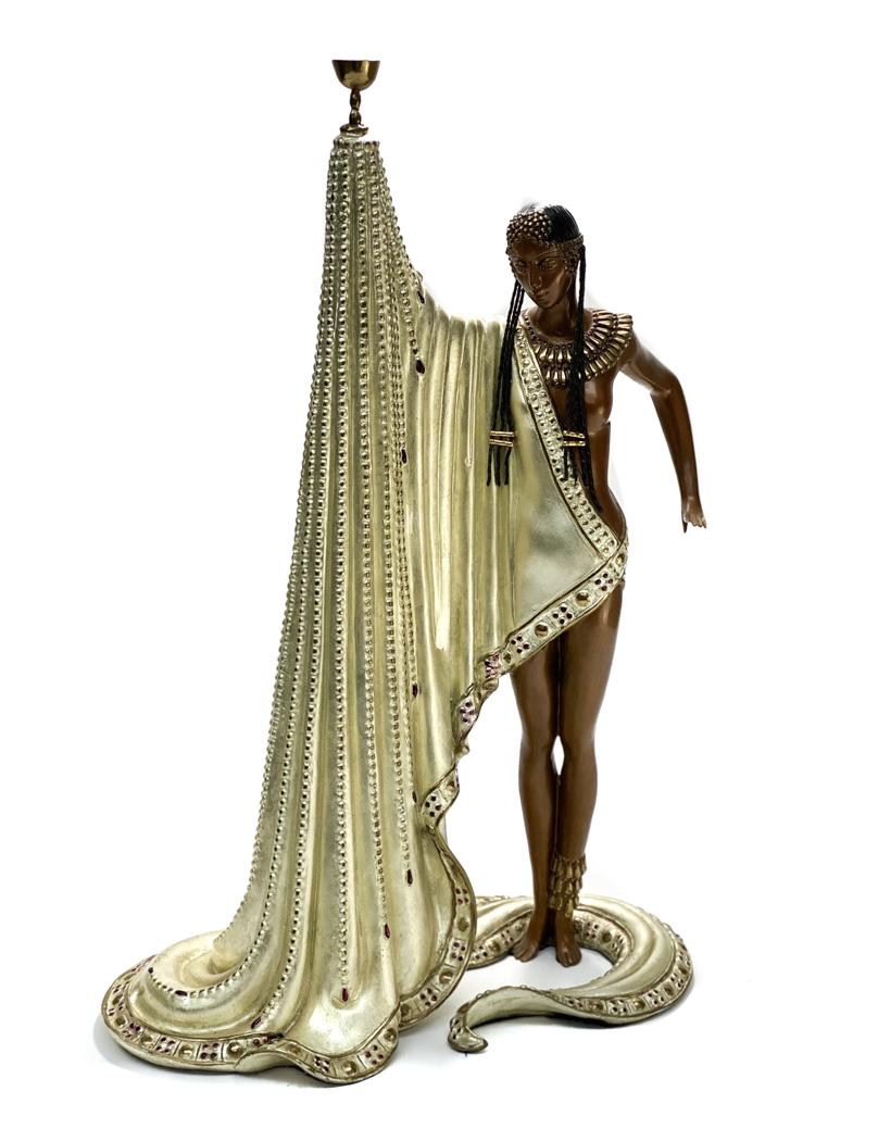 Erte French Bronze Sculpture, The Slave w/ COA: Erte (Romain De Tirtoff) French Russian Bronze Sculpture, The Slave. Ltd Ed 375. The sculpture depicts a partially nude figure in gold draped garbs and holding up a challice. Articulated braided hair.
