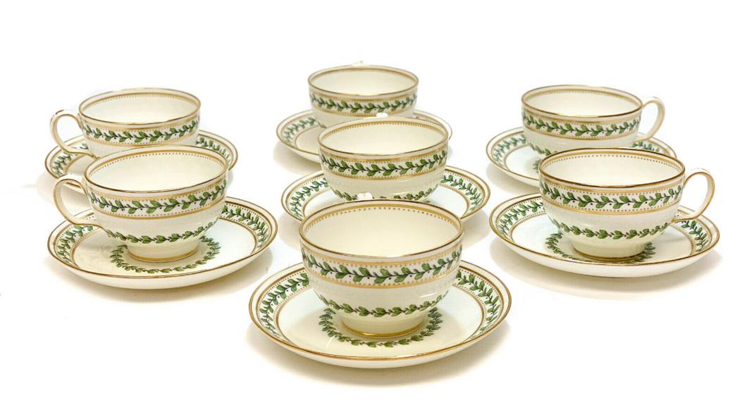 7 Minton England for Tiffany Porcelain Cup & Saucers: 7 Minton England for Tiffany & Co. porcelain cup and saucers, circa 1900. Hand painted leaf vines around the edge and to the center. Minton England mark to the underside. Retailed by Tiffany & Co. Wei