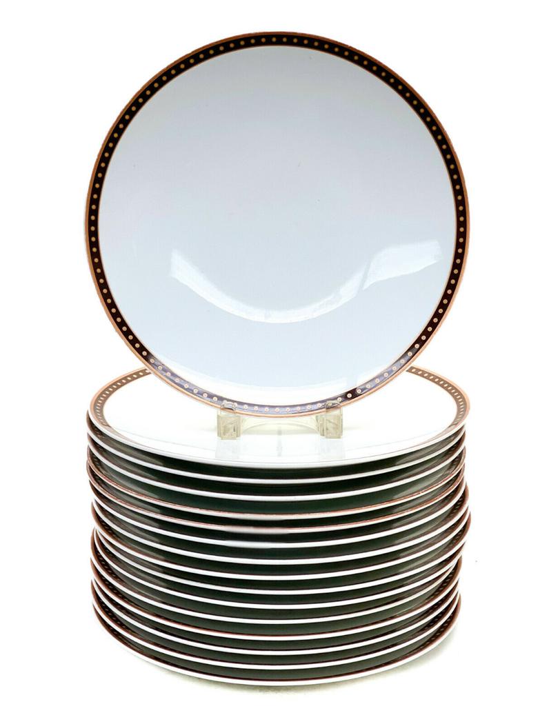 16 Bernardaud Mfg de Porcelaine Chargers, Dotted Rim: 16 Bernardaud Manufacture de Porcelaine chargers. Brown dotted accents to the rim of the chargers. Marked Bernardaud Manufacture de Porcelaine to the underside base. Weight Approx., 30 lbs Measures Ap