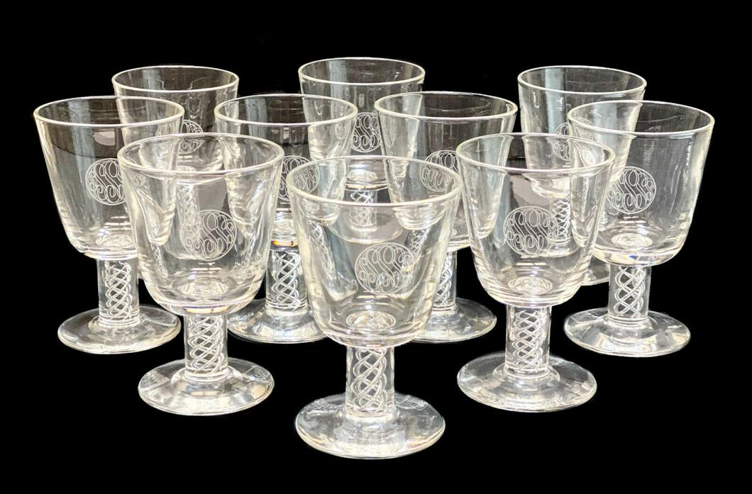 10 Steuben Air Twist Stem Wine Glass Goblets #7917: 10 Steuben wine glass goblets in #7917. Air twists to the stem, and finely etched "SSSSS" monogram to the central areas. Marked "Steuben" to the underside. Weight Approx., 5 lbs Measures Approx., 3 in