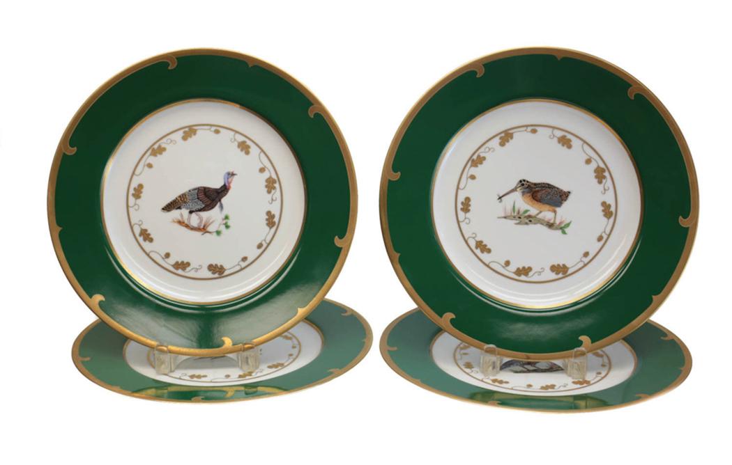 4 Lynn Chase Chargers in Winter Game Birds: 4 Lynn Chase fine porcelain service plates or chargers in Winter Game Birds Green. A hunter green ground with a gold rim 3 different types birds to the center. Lynn Chase marks to the underside. Weigh