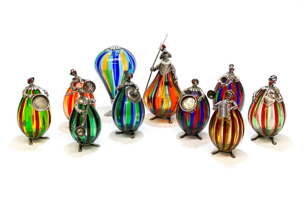 10 Italian silver, enamel and Murano Glass Figurines: A fine group of 10 Italian sterling silver clown figures by Ancini, Arezzo. Hallmarked Ancini with italian silversmith hallmark 1547-AR. Most with orignal stickers. Tallest measures 5.25 inches tall,