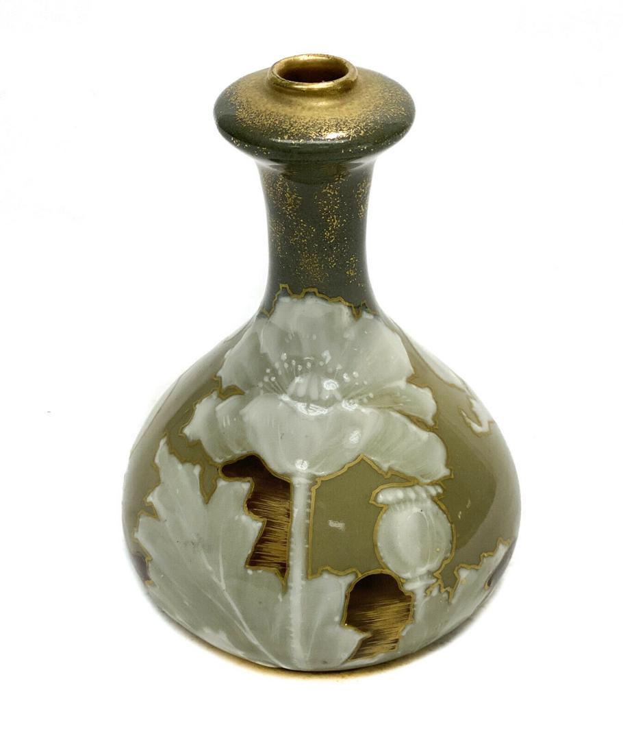 Amphora RSTK Porcelain Enamel Vase: Amphora RSTK porcelain enamel vase, circa 1900. An olive green ground with white enamel floral and gilt accent decoration throughout. Amphora RSTK mark to the underside base. Weight Approx., 0.5 lbs M