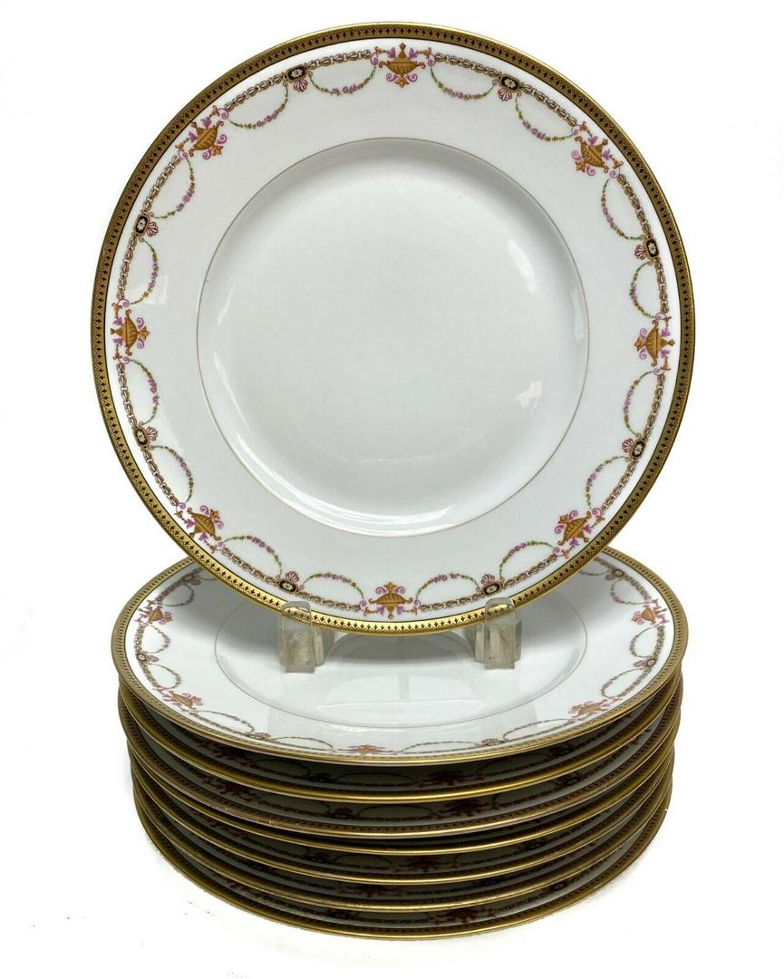 8 Bernardaud Limoges Porcelain Gilt Rimmed Dinner: 8 Bernardaud Limoges Porcelain Gilt Rimmed Dinner Plates with Floral Swags c1910. Floral gilt swag decorations with a white ground. Weight Approx., 8.8 lbs Measures Approx., 9.6 in. diameter x 1.1 in.