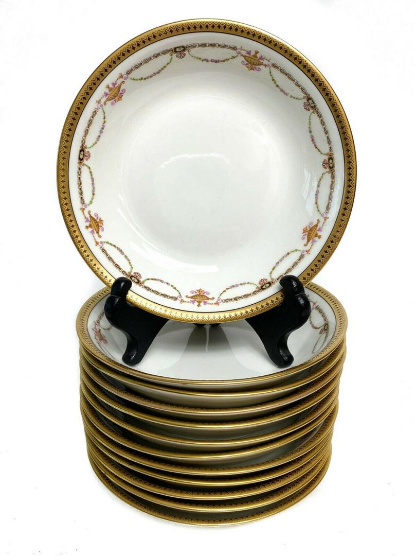 12 Bernardaud Limoges Porcelain Fruit Bowls with Floral: 12 Bernardaud Limoges Porcelain Gilt Rimmed Fruit Bowls with Floral Swags c1910. These bowls can be used as a custard, fruit, or berry bowl. Floral gilt swag decorations with a white ground. in this p