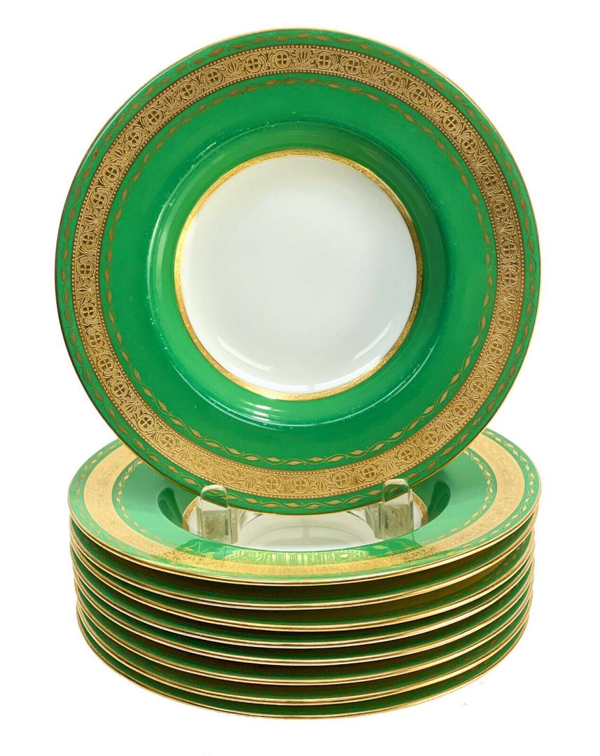 9 Minton England Green & Gilt Porcelain Soup Bowls,: 9 Minton England emerald green & gilt porcelain rimmed soup bowls, 1928. Emerald green ground to the rim with gilt leaf borders. Minton England mark to the underside and incised mark for 1928. Weight 