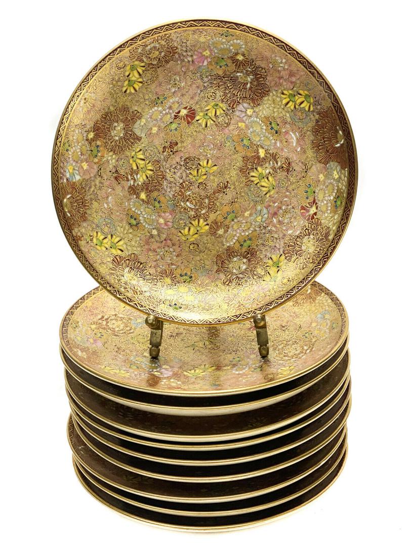 10 Japanese Satsuma Hand Painted Porcelain Bread Plates: 10 Japanese Satsuma hand painted porcelain bread plates, Meiji Period. Gilt floral designs throughout with various hand painted flowers throughout. Japanese Satsuma mark to the underside. Weight Appro