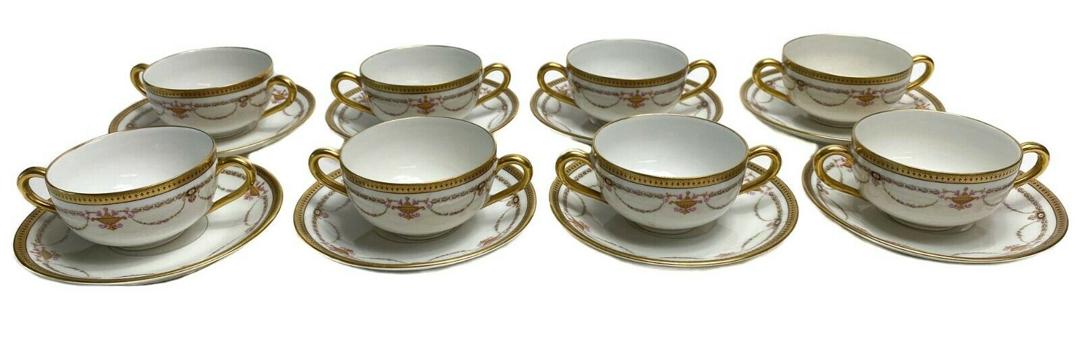 8 Bernardaud Limoges Porcelain Bouillion Cups & Saucers: 8 Bernardaud Limoges Porcelain Gilt Bouillion Tea Cups & Saucers with Floral Swags c1910. Gilt design around rim and floral swag decorations throughout. Weight Approx., 4 lbs Measures Approx., Tea cup
