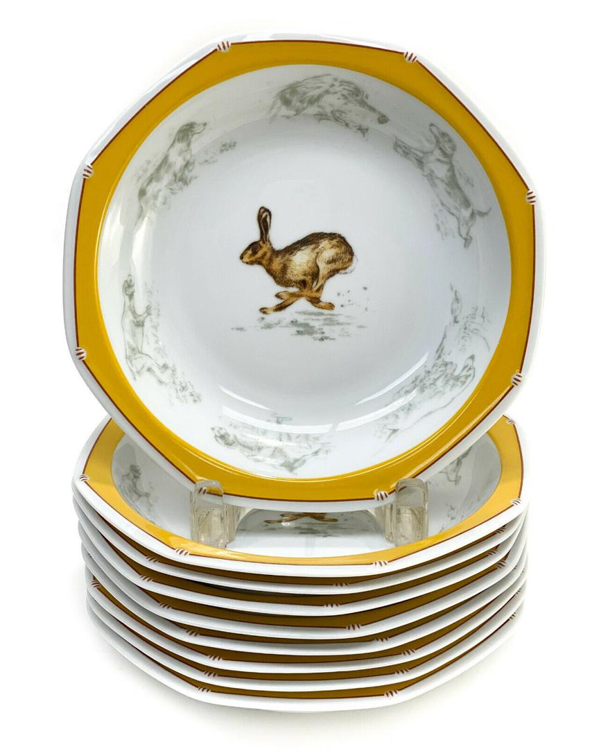 9 Hermes France Porcelain Chasse Yellow Soup Bowls,: 9 Hermes France porcelain Chasse Yellow soup bowls. The bowls depict hares to the center. A hunter yellow ground with figural birds to the border. Hermes mark to the underside base. Weight Approx., 7 