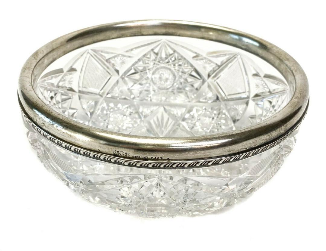 Gorham American Cut Glass Bowl Sterling Silver Mount: Gorham American Brilliant Cut Glass Bowl with Sterling Silver Mount 1899. Gorham mark on rim of silver. Weight Approx., 3.3 lbs Measures Approx., 8 in. diameter x 3.5 in. height. Domestic Shipping: $2