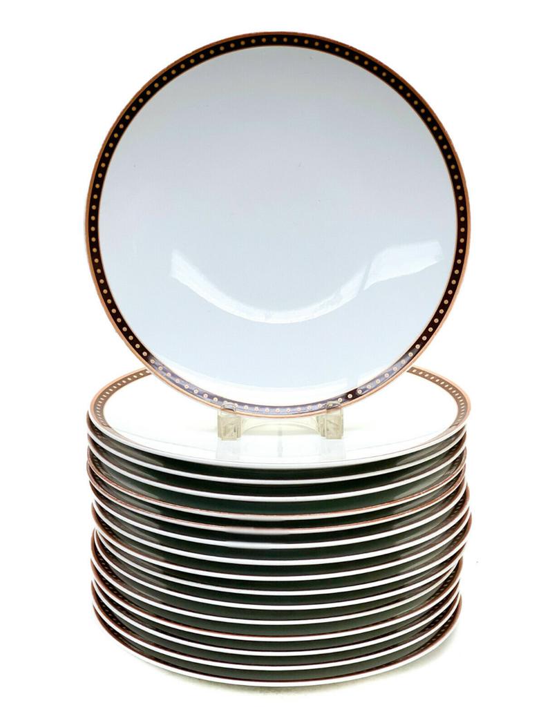 16 Bernardaud Mfg de Porcelaine Chargers, Dotted Rim: 16 Bernardaud Manufacture de Porcelaine chargers. Brown dotted accents to the rim of the chargers. Marked Bernardaud Manufacture de Porcelaine to the underside base. Weight Approx., 30 lbs Measures Ap