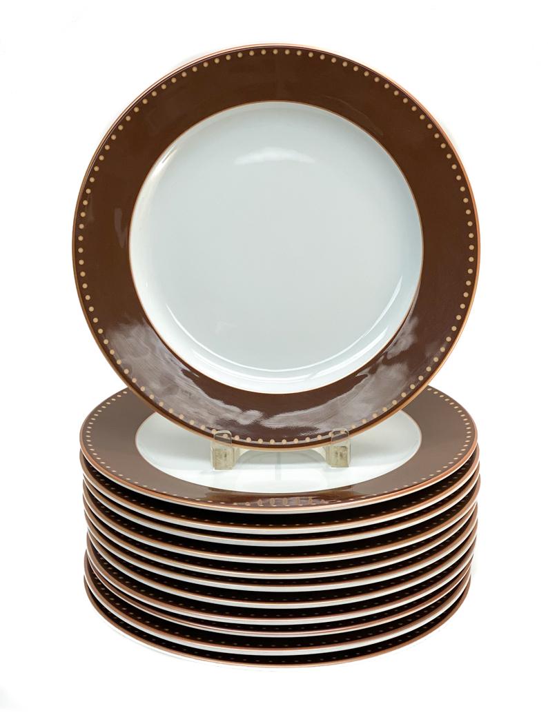 12 Bernardaud French Porcelain Dinner Plates.: Bernardaud French Porcelain Dinner Plates #C992. A brown ground to the rim with circles to the edge. Bernardaud mark to the underside base. Weight Approx., 16 lbs Measures Approx., 11.5 inches diamete