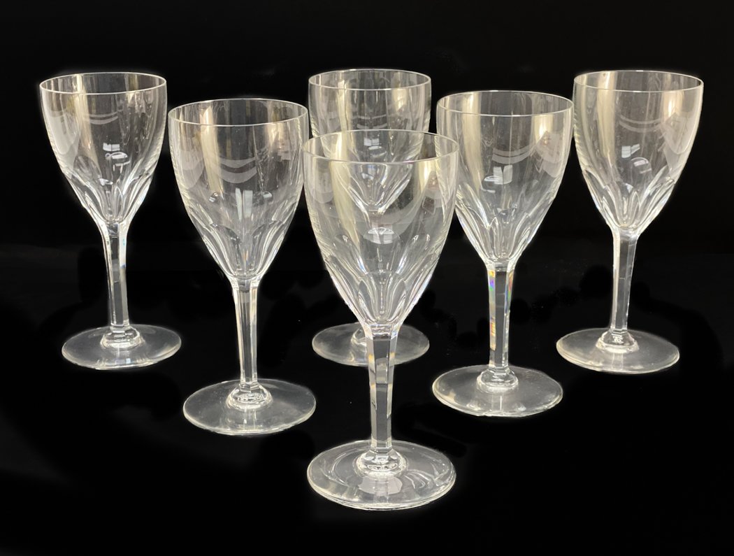 6 Baccarat France Cut Glass Wine Goblets in Genova: 6 Baccarat France cut glass wine goblets in Genova. Thumbprint cut bowl with a six sided stem. Acid etched Baccarat mark to the underside base. All glasses with original Baccarat boxes. Weight Approx.