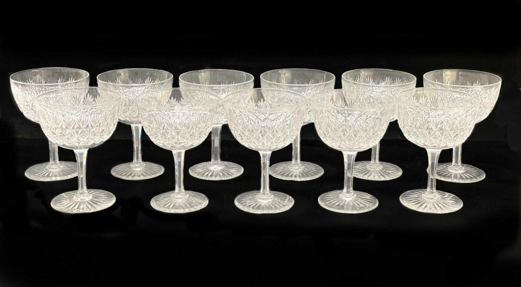 11 Thomas Webb Wellington Cut Crystal Wine Glasses: 11 Thomas Webb Wellington Cut Crystal Wine Glasses. Cut fan and star design with a star to the underside. Weight Approx., 4 lbs Measures Approx., 3.375 inches diameter x 4.5 inches tall.Domestic Shipp
