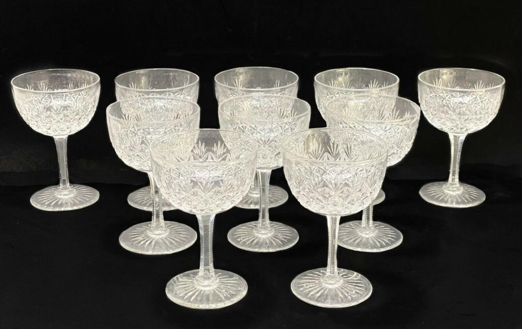 10 Thomas Webb Wellington Cut Crystal Wine Glasses: 10 Thomas Webb Wellington Cut Crystal Wine Glasses. Cut fan and star design with a star to the underside. Webb mark to underside of one. Weight Approx., 3 lbs Measures Approx., 3 inches diameter x 4.5