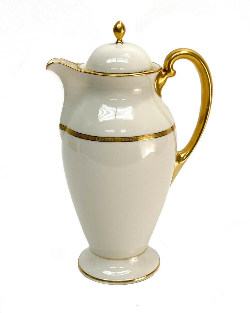 Lenox for Tiffany & Co. Porcelain Coffee Pot, Gilt: Lenox for Tiffany & Co. porcelain coffee pot, circa 1900. Gilt band to the upper circular bands with gilt to the handles. Lenox porcelain mark to the underside base. Weight Approx., 2 lb Measures Appr