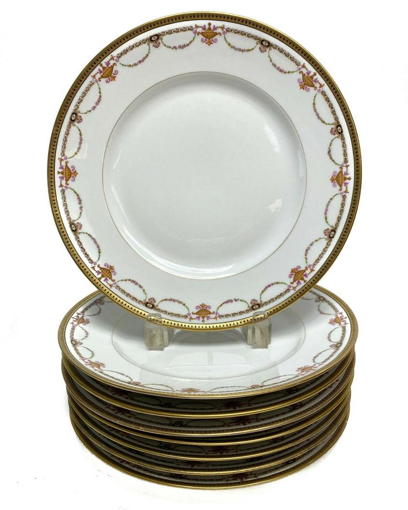 8 Bernardaud Limoges Porcelain Gilt Rimmed Dinner: 8 Bernardaud Limoges Porcelain Gilt Rimmed Dinner Plates with Floral Swags c1910. Floral gilt swag decorations with a white ground. Weight Approx., 8.8 lbs Measures Approx., 9.6 in. diameter x 1.1 in.