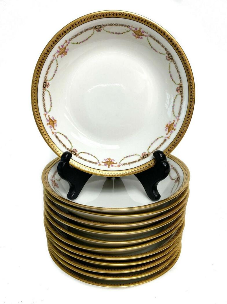 12 Bernardaud Limoges Porcelain Fruit Bowls with Floral: 12 Bernardaud Limoges Porcelain Gilt Rimmed Fruit Bowls with Floral Swags c1910. These bowls can be used as a custard, fruit, or berry bowl. Floral gilt swag decorations with a white ground. in this p
