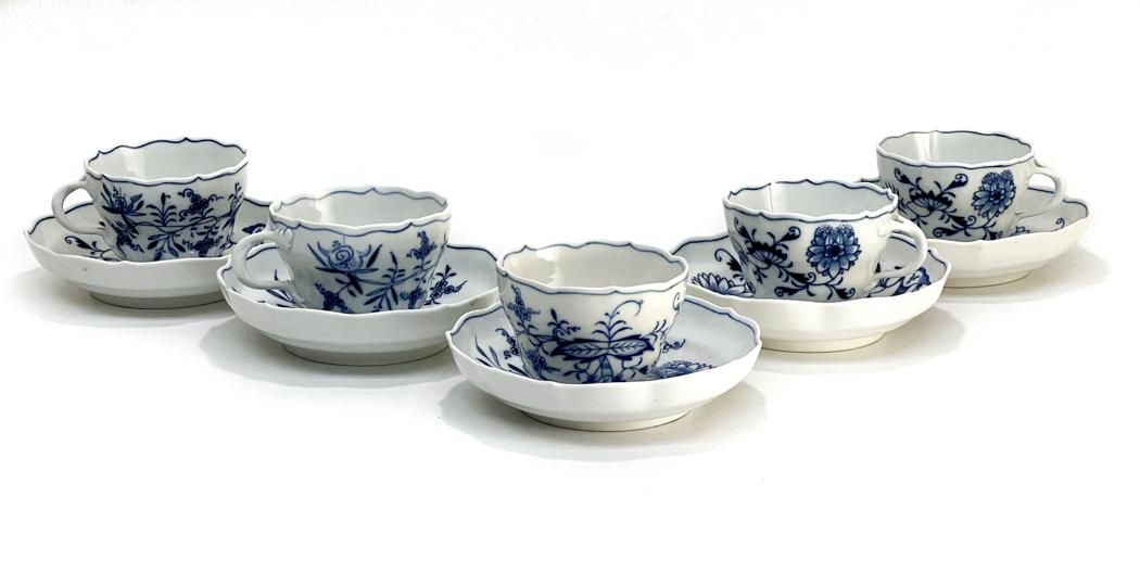 5 Meissen Germany Porcelain Cup and Saucers in Blue: 5 Meissen Germany porcelain cup and saucers. Floral designs throughout. Meissen mark to the underside base. Weight Approx., 2 lbs Measures Approx., Cup: 4.125 inches x 3.25 inches x 2.5 inches tall / 