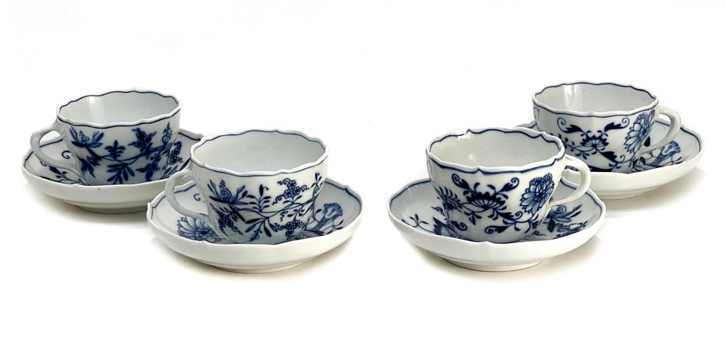 4 Meissen Germany Porcelain Cup and Saucers in Blue: 4 Meissen Germany porcelain cup and saucers. Floral designs throughout. Meissen mark to the underside base. Weight Approx., 2 lbs Measures Approx., Cup: 4.125 inches x 3.25 inches x 2.5 inches tall / 