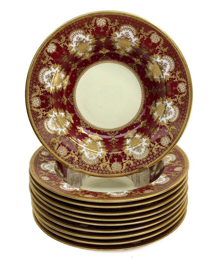 9 Copeland Spode England Porcelain Rimmed Soup Bowls: 9 Copeland Spode England porcelain rimmed soup bowls,circa 1900. A maroon red ground with gilt foliate scroll designs throughout. Copeland Spode mark to the underside base. Weight Approx., 8 lbs Measu
