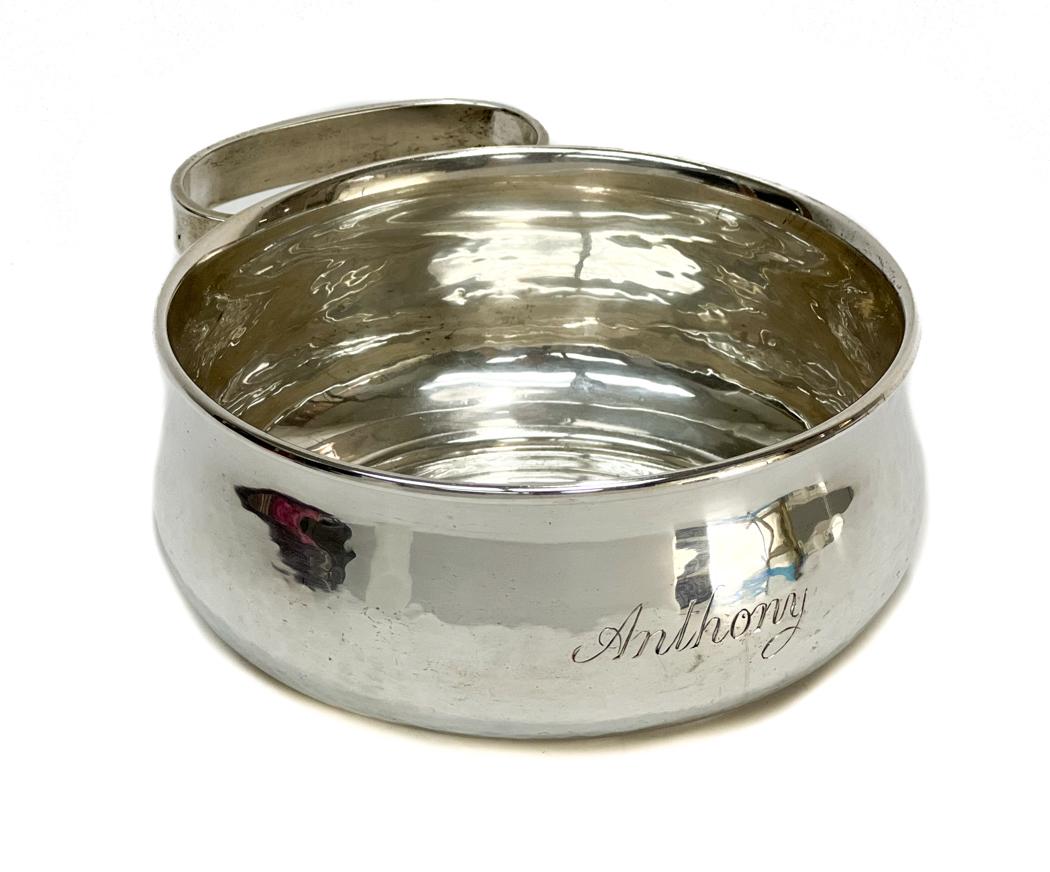 Porter Blanchard Hand Hammered Handled Porringer: Porter Blanchard hand hammered child's handled porringer #870, Mid Century. Hand hammered texture throughout and inscribed "Anthony" to the central area. Porter Blanchard sterling hallmark to the unde