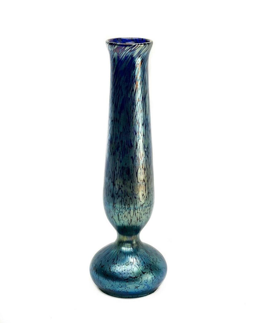 Papillon Hand Blown Blue Aurene Art Glass Vase: Loetz Papillon hand blown blue aurene art glass vase. Blue glass vase with iridescent textured blue aurene body. Polished pontil. Manner of Loetz Weight Approx., 1 lb Measures Approx., 3.75 inches dia