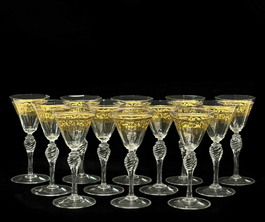 12 Venetian Glass Stemware Gilt and Enamel Wine Glasses: 12 Venetian glass stemware gilt and enamel wine glasses, circa 1970. Octagonal shaped bowls with a gilt foliate design with raised enamel accents in white red and green. A twisted knobbed stem. Slight