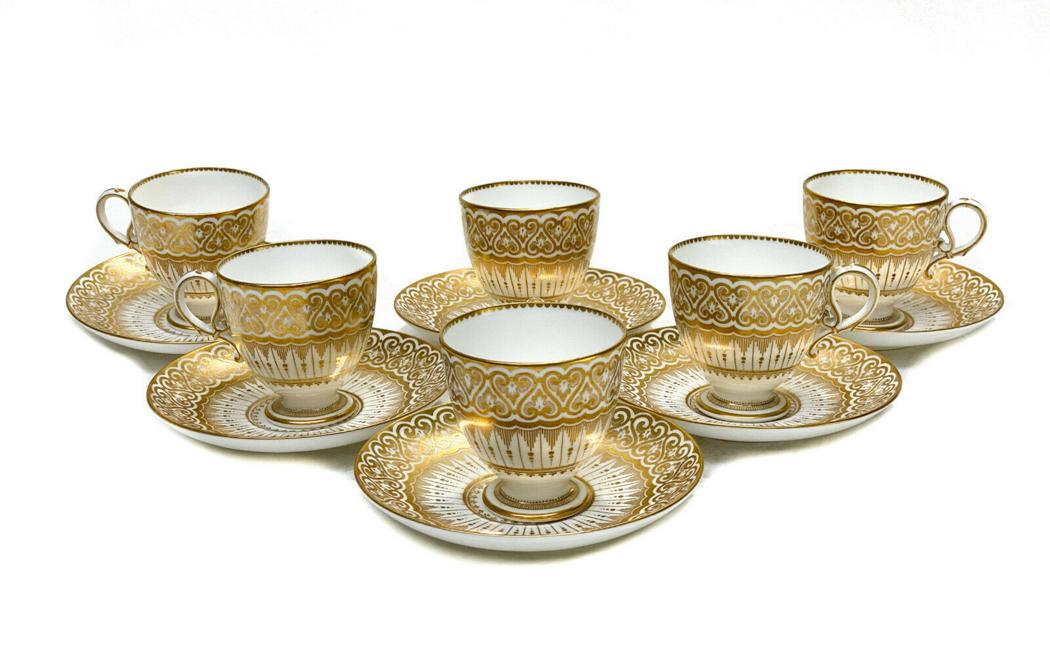 6 Coalport England Porcelain Cup and Saucers: 6 Coalport England porcelain cup and saucers, circa 1890. Gilt foliate scroll designs with dotted accents. Copeland Spode mark to the underside. Weight Approx., 5 lbs Measures Approx., Cup: 3.625 inch