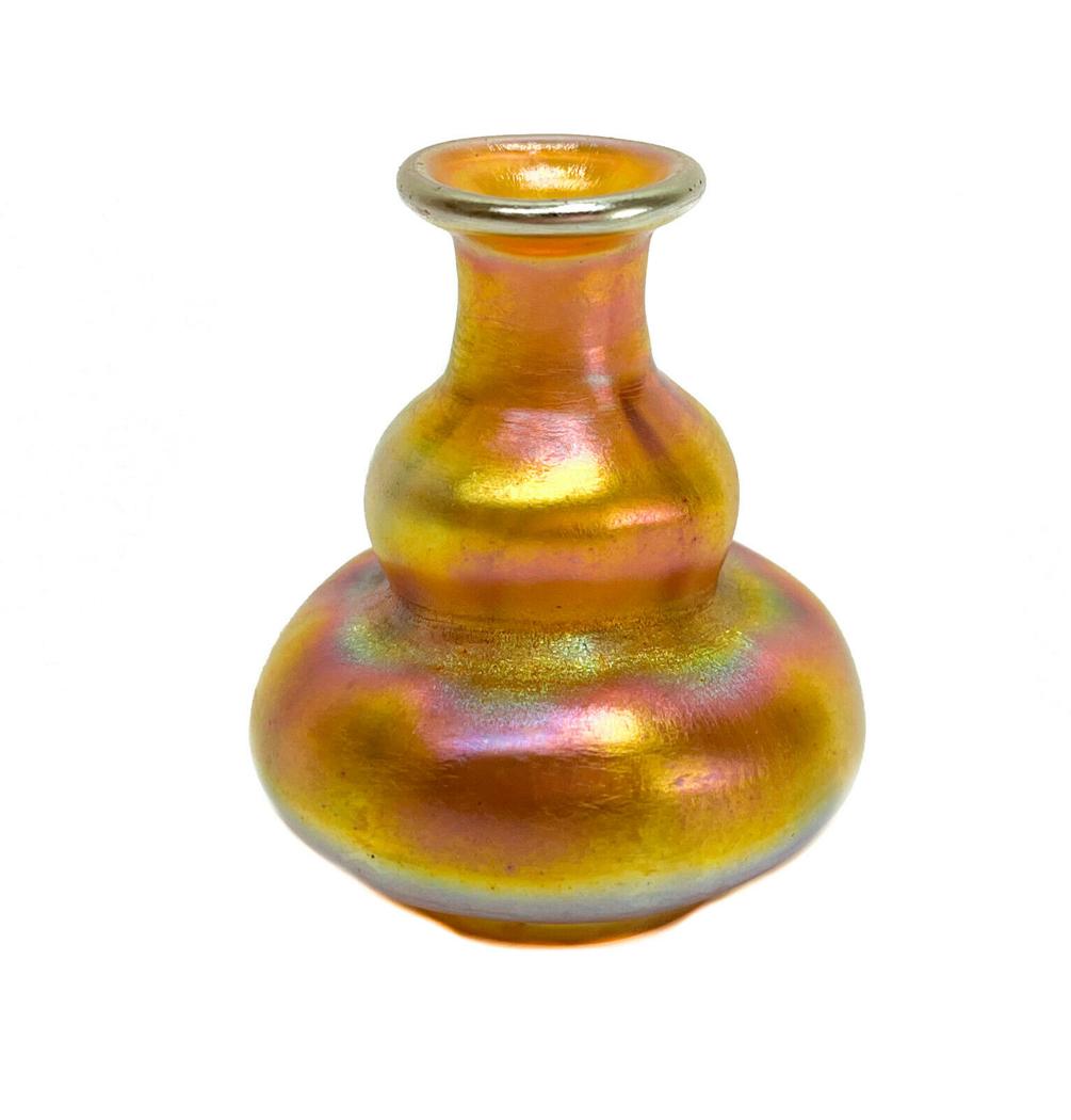 LCT Tiffany Gold Iridescent Favrile Lobed Miniature Vase #1510: LCT Tiffany gold iridescent favrile lobed miniature vase #1510. Marked LCT to the underside. Weight Approx., 0.25 lb Measures Approx., 2.25 inches diameter x 3.5 inches tall