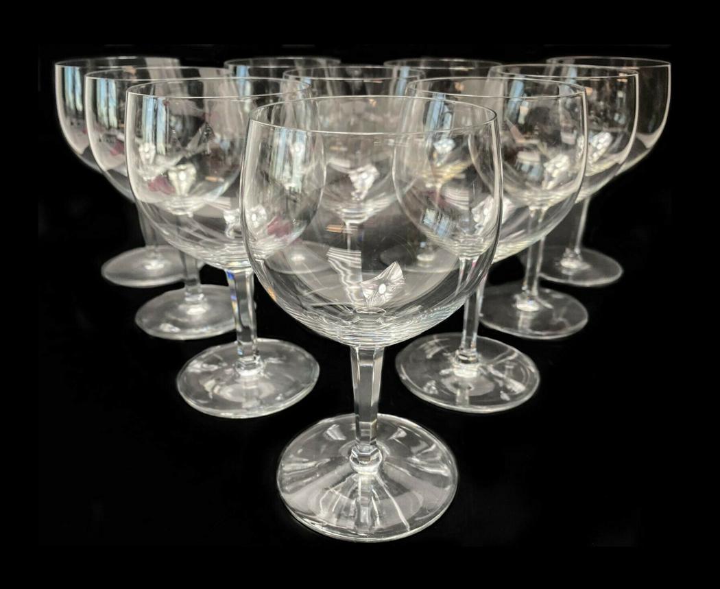 10 Baccarat Rabelais Wine Glasses with Hexagonal Stem: 10 Baccarat Rabelais Patterned Wine Glasses with Hexagonal Stem. Weight Approx., 3 lbs Measures Approx., 3.2 in. diameter x 6 in. tall. Domestic Shipping: $40