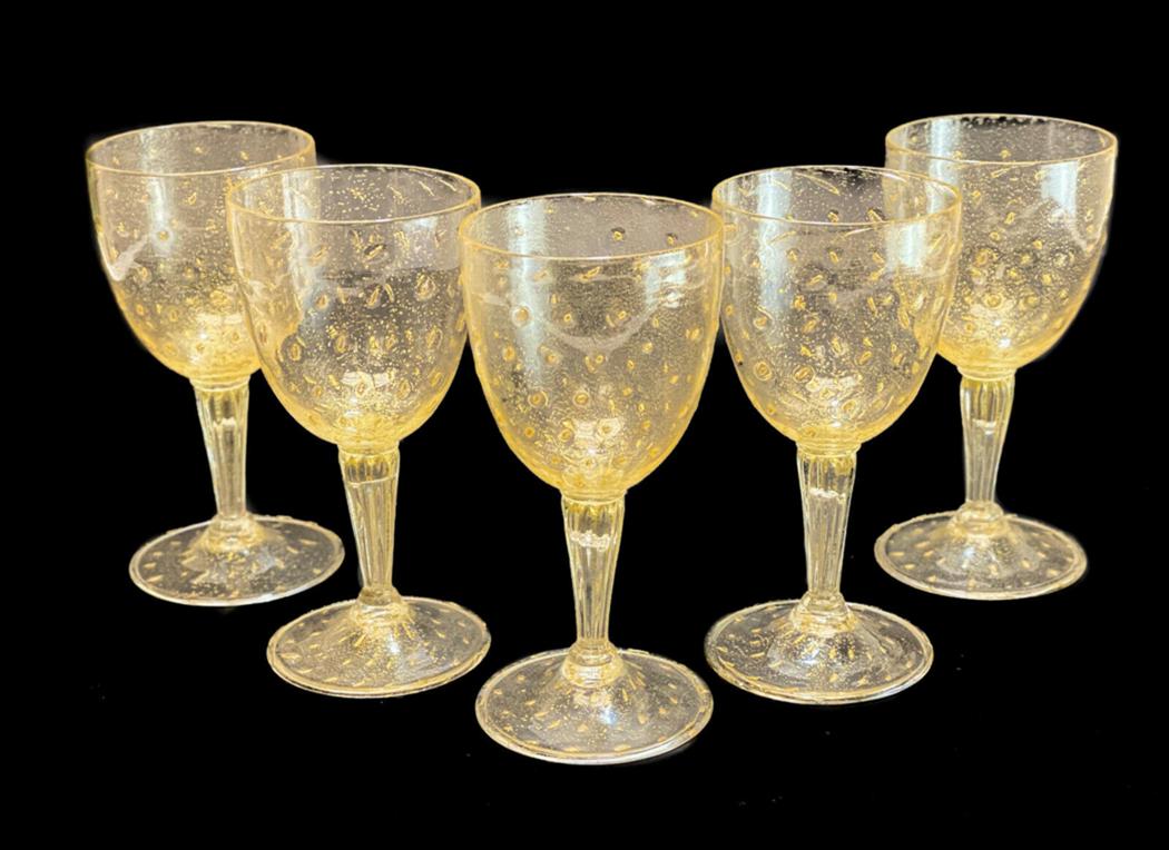 5 Venetian Gold Fleck Bubble Wine Glasses, circa 1950: 5 Venetian gold fleck controlled bubble wine goblet glasses, circa 1950. Ribbed to the stems. Weight Approx., 1 lbs Measures Approx., 2.25 inches diameter x 5.25 inches tall
