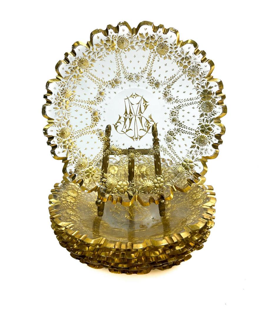 8 Bohemian Intaglio in Gilt Floral Scalloped Dessert Plates: 8 Bohemian Intaglio in gilt floral scalloped dessert plates. A 3 letter monogram to the center. Weight Approx., 1 lbs Measures Approx., 6.5 inches diameter