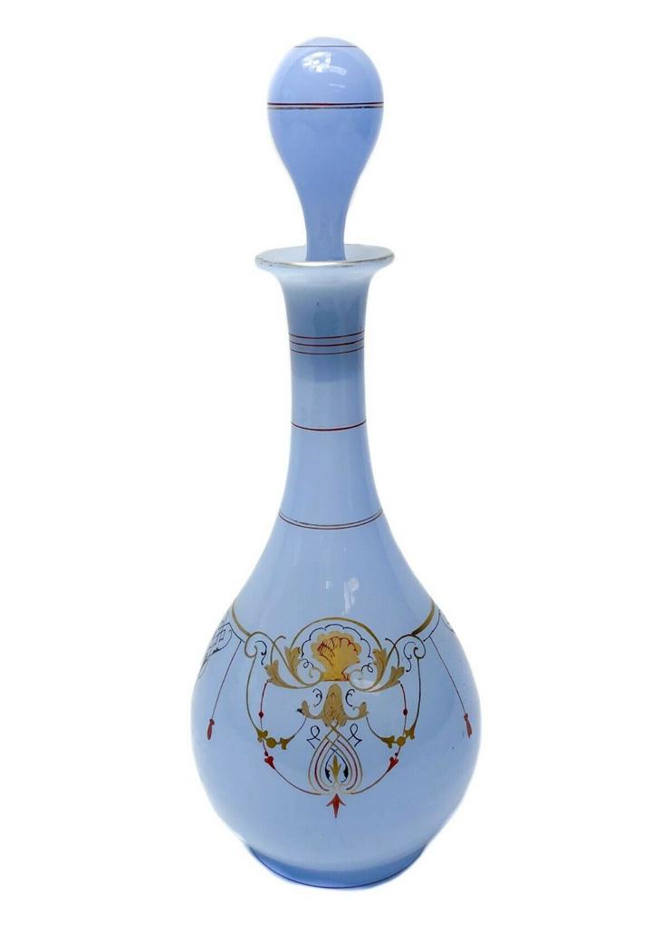 Continental Blue Opaline Glass Decanter Gilt Decoration: Continental blue opaline hand blown w/ polished pontil decanter with hand painted gilt decorations c1930. Weight Approx., 1.3 lbs Measures Approx., 4.5 in. diameter x 11.5 in. tall.Domestic Shipping: