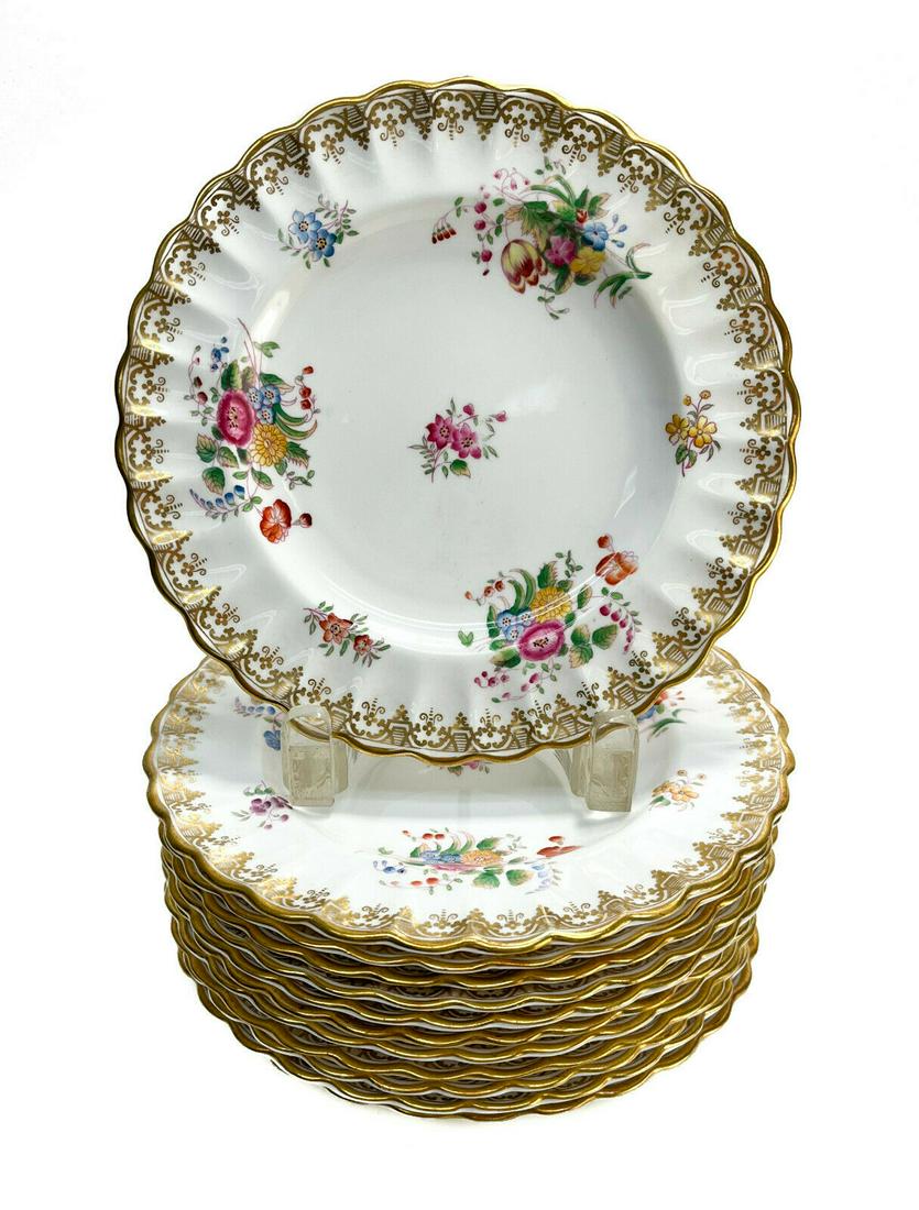 12 Copeland Spode England Porcelain Floral Rimmed Dessert Plates, circa 1920: 12 Copeland Spode England porcelain floral rimmed dessert plates, circa 1920. Florals throughout with a ruffled rim. Copeland Spode mark to the underside retailed by Gilman Collarmore. Weight Approx.,