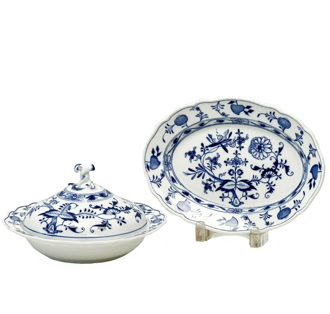 Meissen Germany Hand Painted Porcelain Serving Dish & Round Covered Dish: Meissen Germany hand painted porcelain serving dishes. One oval-shaped serving dish, one round covered serving dish. Blue decoration with onions around the scalloped rim with florals to the center. Me