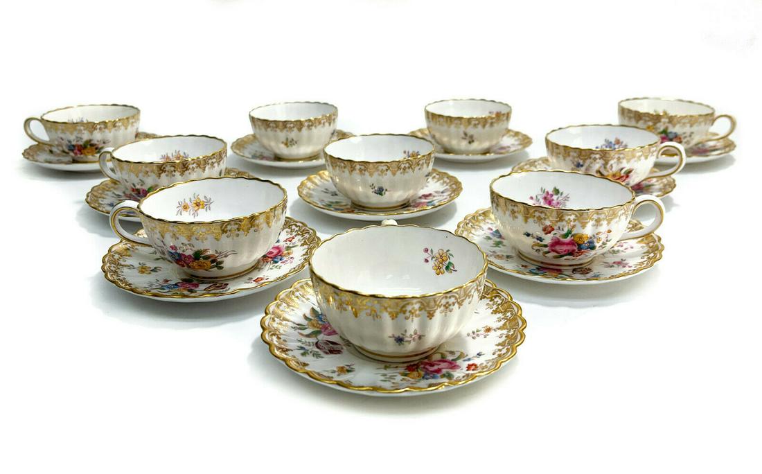10 Copeland Spode England Porcelain Cup and Saucers , circa 1920. Florals: 10 Copeland Spode England porcelain floral cup and saucers, circa 1920. Florals throughout with a ruffled rim. Copeland Spode mark to the underside retailed by Gilman Collarmore. Weight Approx., 5 lbs