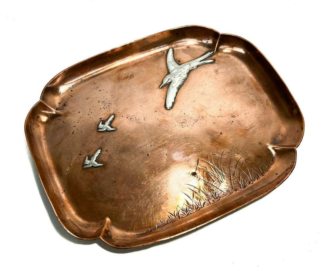 Gorham Mixed Metal Aesthetic Tray, 1881.: Gorham mixed metal Aesthetic tray, 1881. Copper base with silver birds flying to through a grassy field. Gorham sterling silver marks to the underside. Weight Approx., 0.25 lbs Measures Approx., 8.5 i