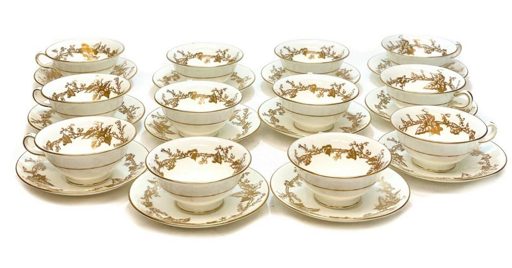 12 Minton England Porcelain Cup & Saucers, circa 1930. Gilt Vine Leaves: 12 Minton England porcelain cup and saucers, circa 1930. Gilt vine leaves around the exterior of the cups and edge of the saucers. Gold Minton England porcelain marks to the underside- reserved for th