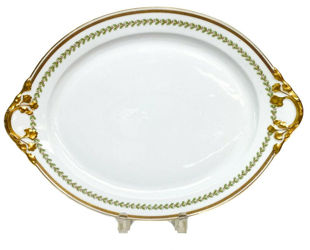 Empire Style William GuÃ©rin Limoges Oval Serving Dish: Empire Style William GuÃ©rin Limoges Oval Serving Tray/Dish c1910. Gilt and leaf decoration around rim of serving tray/dish. Weight Approx., 2.4 lbs Measures Approx., 16 in. x 11.6 in. x 1.2 in. tal