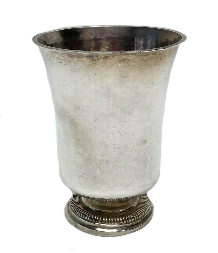 French Sterling Silver Beaker or Christening Cup Paris: French silver beaker or christening cup with decorated base c18th century. Unknown maker mark. Weight Approx., 2.34 ozt Measures Approx., 2.8 in. diameter x 3.5 in. tall. Domestic Shipping: $20