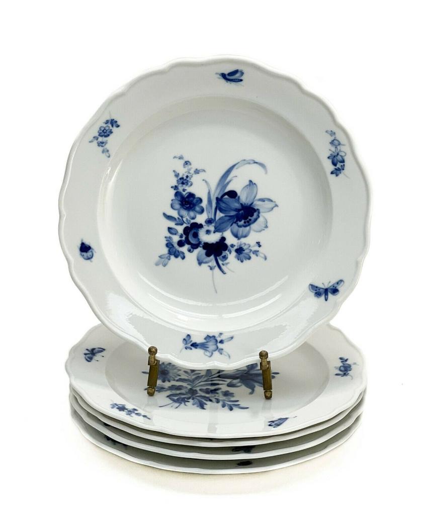 5 Meissen Germany Porcelain Dessert Plates: 5 Meissen Germany hand painted porcelain dessert plates, early 20th century. Blue underglaze decoration of various flowers to center, with flowers and insects to the scalloped rimmed edge. Meissen cro