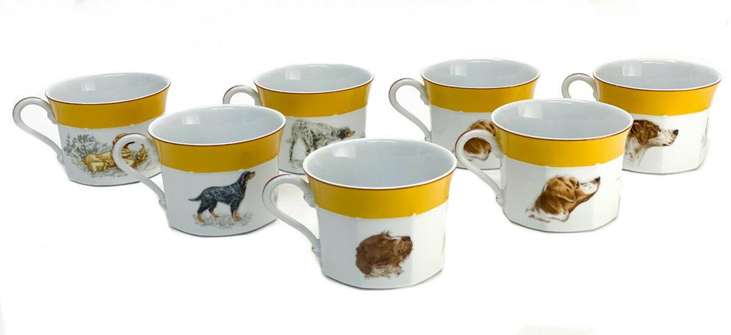 7 Hermes France Porcelain Chasse Yellow Breakfast Cups: 7 Hermes France porcelain Chasse Yellow breakfast cups. Octagonal lobed with various dog heads. A yellow ground the top rim. Hermes mark to the underside base. Weight Approx., 5 lbs Measures Approx., 