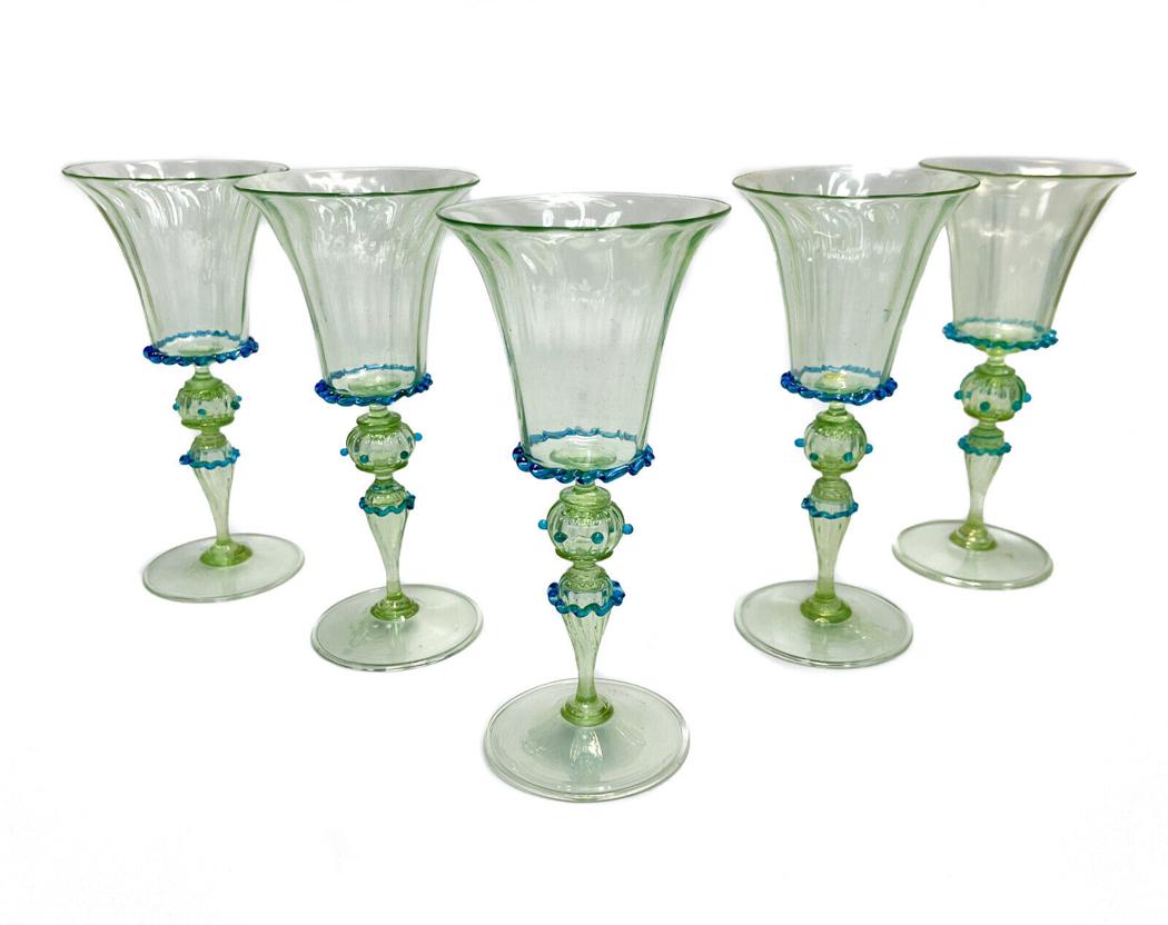 5 Salviati Green Art Glass Blue Ruffled Wine Goblets, circa 1970: 5 Salviati green art glass ruffled wine goblets, circa 1970. Green glass with with a blue ruffled rim to the base and stem. Rough pontil to the underside. Weight Approx., 2 lbs Measures Approx., 3.5 i