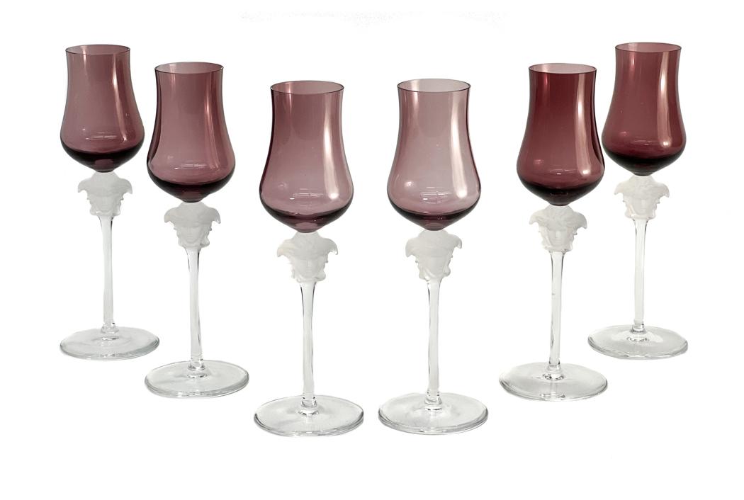 6 Versace Amethyst Medusa Wine Goblets: 6 Versace Amethyst Medusa Wine Goblets. Frosted Medusa head to the stem. Weight Approx., 2.5 lbs Measures Approx., 2.25 inches diameter x 8.5 inches tall Domestic Shipping: $50